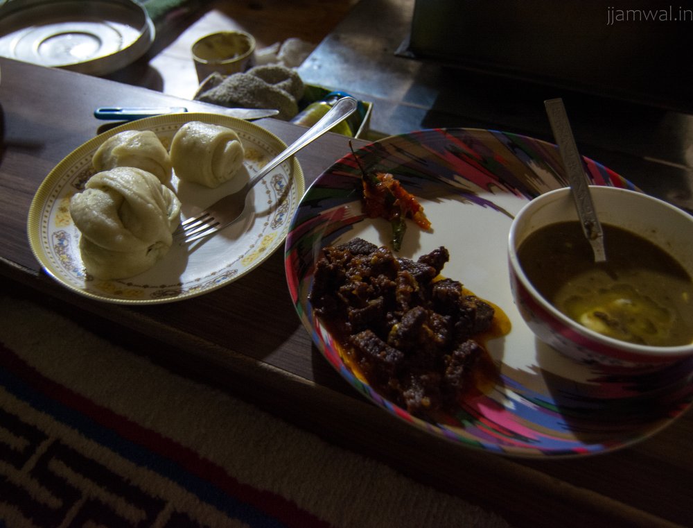 Meal of yak meat, daal and a local bread